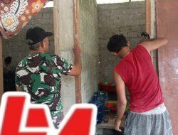Personil Satgas TMMD Ke-127 Kebut Pengecatan Rehab RTLH Milik Melda Evika